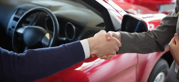 car dealer handshake