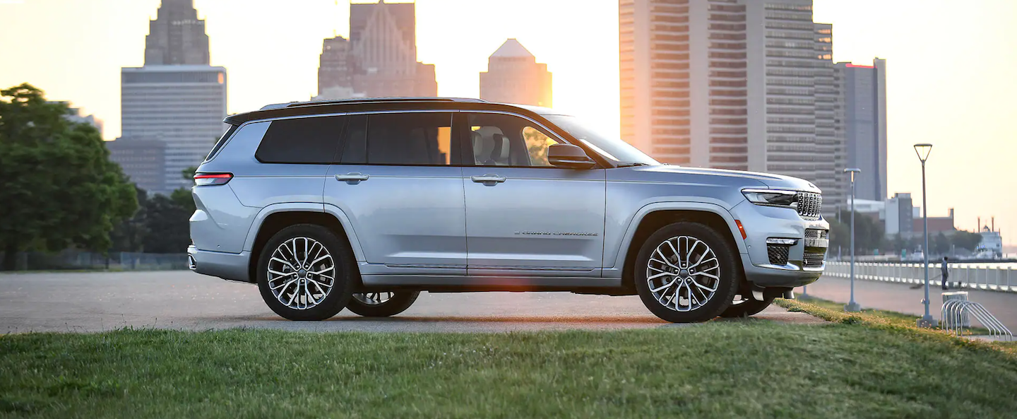 The 2021 Jeep Grand Cherokee L parked by a city.