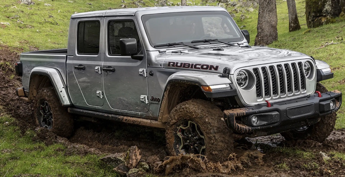 2023 Jeep Gladiator driving through mud