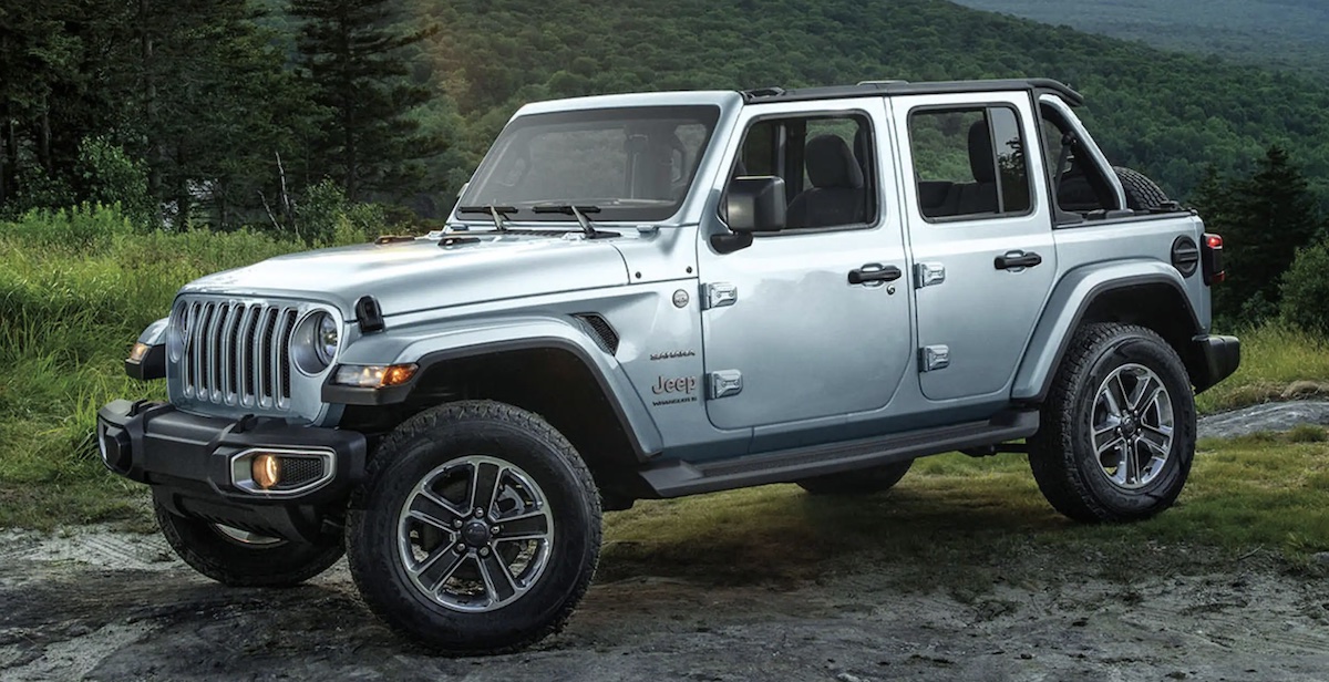 Grey Jeep Wrangler parked on a slab in the moutain area