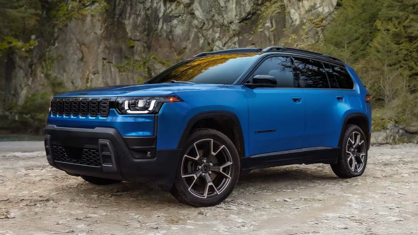 Side profile view of the 2026 Jeep Cherokee in an off-road setting