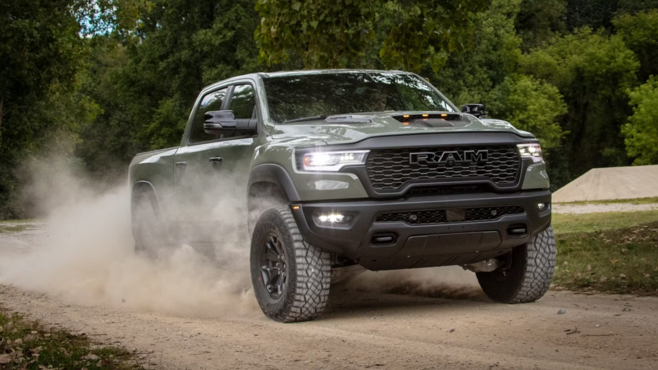 Front view of a 2026 RAM 1500 on a dirt road